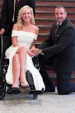 I wore this dress to my courthouse ceremony and it was perfect and photographed beautifully. The fabric is thick and lined and holds its shape well. I am in a wheelchair so I had to find a dress that looked and felt great while sitting and this was perfect. - Melissa D.