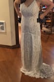 It's beautiful and fits great, very boho style. Not exactly what I was looking for so returned. - Hailie B.
