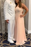 I Order a L because I gain few Pounds. I lost the weight and it fits a bit loose but  M would had being perfect. I normally wear M. Love the material and the way it flows. I had many compliments. Sorry didn't have shoes on the first picture. - Lindy G.