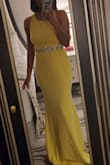 I paired the dress with a silver belt and loved it even more. I wore 6 inch wedges and it still dragged the floor not that I minded - Yasmine W.