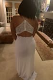 It's a nice dress.seems like quality material. I'm 5ft 1nch y'all. I have to get the split height and get it hemmed. But that's a height problem short people like myself are used to. Love the back. - JoJo M.