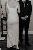 This was just what I was looking for for my wedding! Simple and beautiful, easy to put on, easy to dance in. The fabric is thick, not too see-through, and has a little stretch which was nice for some last-minute weight changes. The tiniest bit loose in the bust (but I'm pretty small there). To wear flats I got it hemmed about 2". - Hannah H.