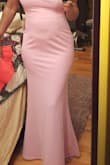 Dress fits very well.  Love the flare at the bottom after a form fitted top.  Enough stretch to allow a fuller figure to wear a medium without being too tight. - Lorie J.