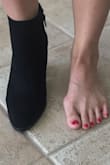 I was surprised how roomy these boots are on my wide feet. I have bunions on my feet and was concerned these wouldn't fit but they do even with socks. I'm goin back to order the tan one - Natalie T.
