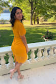 I usually am a Small/Medium in dress but it always depends on the fit as I am on the curvier side- especially my bottom. I got a small in this and it fit nice! The material was a little lose near my waist and bunched by my hips as it's not SUPER form fitting and didn't really know where to fall because of my curves. Totally wasn't a deal breaker though as it still formed me nicely and the color was GORG! I wouldn't have gone a smaller size either because then the underslip would've been too short. I received so many compliments on the dress.. elegant yet sexy. Perfect wedding guest dress in my opinion- and all my sister's and friends have asked to borrow it! - Jocelyn C.