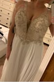 I bought this for my beach wedding next June and couldn't be happier! It's beautifully made, the quality is great and the price is even better. The only thing I need tailored is the length, which I already figured because I'm short, otherwise I can't wait to wear it!! - Megan T.