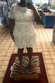 I didnt like the loose fit so I got it tailored. Other than that i love this dress! - Nkeng A.