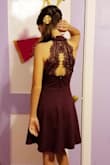 My daughter wore this dress to her Jr. High Fall Ball and LOVED IT!!!  The material was top quality and didn't feel cheap at all.  The wrinkles came out easily in my dryer's wrinkle remover option, with no damage to the dress.  The lace on the back held up nicely with all the dancing those girls did that night.  My daughter is under size for her age, so we ordered the smallest size we could.  All I had to do was tighten up the choker part of the dress, and it brought it all together for her.  With her gold, sparkly, heels and fancy dress, she felt so happy. - Julie A.