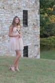 I love this dress! I wore it to homecoming and it was comfortable and cute! I got a lot of complements. It is a little low but fine if you are kind of flat (AKA me lol). I highly recommend this dress! - Caroline C.