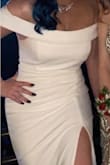 I will say that the first dress came in with some stains but I was able to get a replacement within a few days! The dress came in on time and it looked beautiful. Not tight at all, more of a comfy stretchy material. It was able to hold my chest up perfectly without a bra which is a plus!! The simplicity of the dress just brought out the blue in my hair! Definitely will be buy from Lulus again! - Madison A.