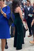 I looove this jumpsuit! I want it in all colors now. I've worn it to two weddings and got so many compliments. The emerald color is gorgeous. I did have to sew the top around the bust closed (personal preference) and I had to hem the straps because I'm short. I can't see this fitting a taller person because I can wear heels with it and the length is just right. - Fm M.