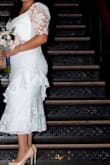 A little big but send it fixed. all my family and friends liked the dress. - Lucy O.