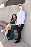 Initially the dress was too big near my shoulders and bust and I probably could've ordered a large but I felt absolutely beautiful in this dress! The slit is on the left leg and flows beautifully. I was also able to iron my dress on low heat without ruining the material in anyway. I personally did not wear a bra with this dress. Here are two of my engagement photos. - Bianca A.