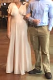 I LOVED this dress- I wore it for my rehearsal dinner before my wedding and it was perfect! I ordered a large because I have a large bust, and I was surprised at how much room I had. I actually had it taken in around the bust, and it was a little long, but with heels it was fine! Overall very satisfied! - Erin M.
