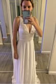 It's beautiful. A bit too fancy for my rehearsal dinner/welcome party for my destination wedding, which is what I purchased it for. Would have almost worked perfectly for a wedding dress. I like it so much I'm gonna keep it and figure out where I could wear it. I'm having a second reception in my hometown after my destination wedding, I think I'll wear this to that. - Shannon L.