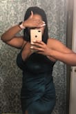 Definitely is a more generous cut than most "large" dresses on here--and does give, if not stretch. The green color is cooler than expected--less like the model's and more like the review photos. It almost leaned a bit teal. I absolutely needed a size large for my wide hips (but no booty lol) and generous bust, however this dress just seemed to twist and drape strangely across my body--not sure why. When I tried pulling the split close, it would shift the whole dress, and twist it so that the side and back seams were askew. In the end, I gave up and my split landed  super high up on my thigh. I honestly would have probably done better with a medium, but then I'm sure the split would have pulled open even more, right down the middle and exposed my "mistletoe" to my holiday guests--LOL! 
All in all, I wish it could have worked out for me because it looks so pretty, but this just might be one of those dresses for me. :( I think those with more narrow body types, or a petite pear shape might do well with this! - Angela C.