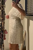 This dress is lovely! Comfortable, well made, and perfectly suited to all kinds of events thanks to the lovely champagne color. I ordered a L though I usually wear a M (it was the only size left), and it fits like a just slightly larger M. For being short waisted, I'll need to get it altered to take up some torso gapping, if that helps any others. - Stephanie M.