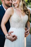 After trying on several overpriced wedding gowns in local shops, I took a chance and ordered this one when I saw it pop-up online. I'm SO GLAD I did!! It was the perfect beach wedding dress! The detailed beading and flattering fit made me feel like I was wearing a very expensive dress! Family and friends were shocked to know how little I paid for it. I had to get it professionally pressed and straps shortened but other than that it was perfect when I got it. It also delivered super quick! Highly recommend for a wedding or even a formal event. - Shana H.