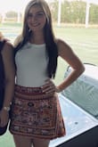 Got to wear this gem at brunch for a friends birthday. I asked the experts on the website what size they recommend and they did a great job at telling me to go up a size because although I am short, I have curves. I wear shorts under my skirts and with the shorts, it fit perfectly and was very comfortable. I normally am a medium in pants size 4. - Lauren S.