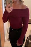 8/10.
I wish the top part was sewn down or something. The top rolls up when I move my arms and it has a permanent roll to the edge from rolling up so often. Maybe I needed to size up, but I like fitted sweaters. - Michelle M.