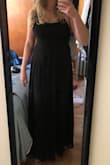 Great dress, very pretty and it has a nice cut. The material is a bit cheap but you can't really tell. I got so many compliments! I don't have any picture of the back of the dress, but it's pretty and sexy. - Sabrina D.