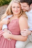 I wore this for my engagement photos and it was PERFECT! I first got a large and it did fit, but I wanted to make sure it didn't look too snug so I sized up. Unfortunately, my chest isn't that big so the top was large, but that was to be expected. I highly recommend! It's perfect and well made. - Becky S.