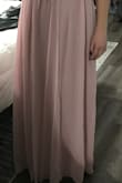 I'm very happy with this dress. I normally wear a medium but have come to find most mediums are too long even with heels and i'm already tall so I took a chance with the small. It's the perfect length and fit except a tad snug around the top but still wearable. - Erica S.