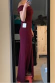Love everything about this dress. It fits perfectly. The only issue is how long it is. I'm planning to wear 2" heels, and I needed to get it hemmed significantly. I tried to walk around before the hem to see if it was necessary and was tripping over the length. I was also pleasantly surprised to see that the straps stayed in place even when I reached up. I thought they might end up needing constant adjustment. I can't wait to wear it, and highly suggest this dress for others looking for a formal dress! - Lindsay F.