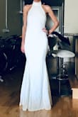 The dress is gorgeous, but runs small. I think a medium will be too big so I'm going to have it let out a smidge and wear it for my rehearsal dinner. - Brooke B.
