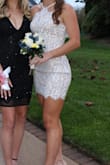 This dress was gorgeous! Very simple yet so pretty! Was a bit baggy in the back, but took it in slightly and it fit great! - Avery C.