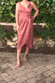 This dress is perfect when out on. The satin material is really nice and it shows when your wearing it. 10/10 would buy again. - Ashley M.