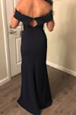 I love this dress! It looks so good on. The material is fantastic! BUT the zipper is so cheap. There is one spot in the seam that is extremely difficult to zip up even when the dress is not on me. I'm keeping the dress for a a wedding I'm in but I'm so disappointed in the awful zipper. This is the 2nd of this dress that I've ordered and unfortunately it's just a design flaw. - Annette M.