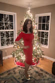 I bought this dress in black a while ago and loved it so much I had to get the red for this holiday season! It didn't disappoint. I just wore it to a party last night and received so many compliments. I absolutely love how this dress fits and shows off all my curves but does it in a classy, retro way. The red color does tend to show more wrinkling than the black... the black is a little more photo forgiving. I grabbed a M but could've maybe sized up to allow a little more wiggle room. I do like things nice and fitted though so the M worked for me! All in all a great go-to dress that's made well. Props to the stretchy material too! I see more colors in my future! - Mindy Q.