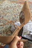 I always size a half size down from my usual size when I buy heels. Normally I am a 9 and these are an 8.5 and they fit great. There is enough length in the laces to go around my calves multiple times. They are gorgeous and are comfortable enough. I have only worn them around my house for about an hour...so I am not sure how they will feel for an entire event. I am really happy with them except for the color difference. Mine are clearly a darker brown compared to the neutral tone advertised. This is disappointing since I bought them for my wedding rehearsal and reception and want them to match my nude tone hat. - Kassi W.