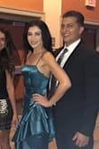 I love everything about this dress. The shape and fabric is stunning. However, I bought an XS cause I read that it runs big, and STILL had to take it to the tailor. Fits like a glove now. I wore it to a company Christmas dinner and got so many compliments. I'm going to wear it again for my Christmas recital. It think it's worth the buy, despite the sizing issue. - Andrea M.