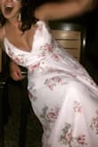 Bought this dress last minute for my friends wedding. 100% procrastinated, so I got lucky with this purchase. The top was very tight, so I had to remove the metal clasp and replace it with a safety pin a bit lower. The dress was pretty easy to work with since it was a wrap style. It was a bit long, but was manageable in heels' i didnt have time to get it altered but probably will in the future. It made me feel like a princess - Jenny P.