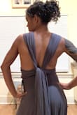 I don't enjoy getting dressed up, so the idea of finding something to wear as my best friends' maid of honor was daunting. When I saw the dress online I had high hopes but was prepared for disappointment. But, lo and behold, it was perfect! The versatility made it fun. The material made me feel like I was wearing a very soft t-shirt. It flows beautifully with movement. I wore flats and so it did drag on the floor a bit, but it worked since we were indoors. I am going to hem off an inch for the next event in case I have to be outdoors. The other bridesmaid wore the same dress with a different tie, which made for interesting and beautiful eye candy! - Cristin N.