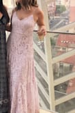 I got this dress to wear to a wedding next month. The color is perfect for spring! It's definitely too long and I need to have it altered because even with heels it's about 2 inches too long. Also I need to have it taken in near the cleavage area because it's too large. I did expect I would need to make these alterations as I am short and lacking cleavage lol. All in all, it's beautiful and perfect for a spring wedding! - Alexis R.
