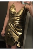 I wanted & NEEDED to LOVE this! I have been searching Lulus website for a couple years now, and finally decided to order a dress for my husband's formal, work Christmas party. I looked at every cocktail dress they had in my size. I kept coming back to this one, but really didn't want to get a $98 dress for 1 event. I finally decided I had to have it. I received the dress yesterday and & after trying it on with numerous bras and undergarments, I realized I just can't make it work. The top area does not fit at all like I expected, it doesn't look even close to the quality of the dress the model is wearing, and it is NOT the same color (which was my favorite part). Also, I knew it would be thin, but I feel like I could rip it like a piece of paper. I am soooo sad and disappointed. I will be using my lunch break today to run to the mall in hopes that I can find something quick enough. 
*I will say though, I also ordered some thigh high black boots and I do LOVE them! - Acacia F.