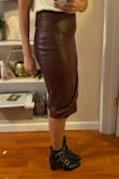 I fell in love with this skirt at first and was so excited to get to wear it. The material is great. However, when I went to wear it I decided to do so with a shirt tucked into the skirt and it completely messed up the structure of the skirt. I will be sadly looking to return it. - Marcy D.