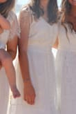 The dress is for my 12 yr old daughter as pictured. The material is light but the liner is perfect helping it not be see through. She feels so pretty, she is wearing the dress to a beach wedding, not happened yet so we do not have another picture yet. - Suzanne G.