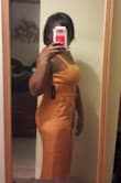 I was skeptical until it arrived.  The color is perfect for my complexion and the size is perfect.  I always have to up size anyway. I tried it on without a bra but will wear a strapless when the time comes. - Jennifer J.