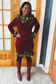 I bought this sweater dress for 'ugly sweater' day at the office. I bought some decor from the dollar store and used safety pins to hold everything together without destroying the dress.
Everything turned out perfect! The dress fit perfectly and hugged my curves and showed off my booty. It was neither tighter nor loose on my body. It was just right! I have very big boobs and a bit of a tummy since I do have twins. The dress made my tummy look small.
I'm rocking this dress with black tights and Marc Fisher red/burgundy boots. - Sophia R.