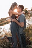 I do love this dress! It's actually long enough and surprisingly stays up with my small chest. The grey one was tight enough but the elastic on the green one was too big and I had to get it altered. I like that it can be casual or dressed up! - Morgan N.