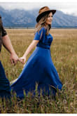 The dress was perfect for our couples shoot - it was so comfortable & beautiful I had to by it in the blue floral pattern. Due to my 5'4" frame, I had to have it hemmed a few inches, but otherwise, it is gorgeous... it photographs so well, too! - Ashley J.