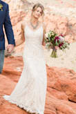 This dress is PERFECT. It's so flattering, photographs beautifully, and is SO COMFORTABLE. I had a few alterations done (added cups, bustle, sewed straps so they were no longer adjustable, and had it hemmed). If you are even considering this dress as a maybe, BUY IT to try it on! You will fall in love. I eloped in Las Vegas and hiked through the wilderness and then wore it all over Vegas and it still looks brand new/clean! I cannot believe how well it held up. - Elizabeth M.