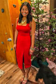 Absolutely love this dress! Fits so perfectly and hugs the way it should. Doesn't show too much skin, but has the perfect slit and framing to make a statement. The red was to die for and make a statement. - Christen H.