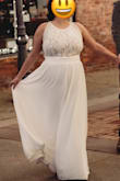 This dress was absolutely amazing for my wedding!! I was really nervous about fit but it made me look beautiful. It photographed beautifully and I only had to get it hemmed a little. The photos don't do justice for how nice the dress looks in person. Your bra will show in the side panel but that wasn't an issue for me - I probably could have hidden it by adding more fabric but decided not to. The fabric was really nice and I got so many compliments on it. No one could believe I spent less than $100! - Rachel W.