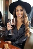 I have a small head so I was afraid this hat  wouldn't fit...but it fit perfectly !! You can dress it up or down. The best part is you don't need long flowy hair to make it cute you can wear it with your hair up and some side flowy pieces . If you are thinking about getting this hat....think no more. BUY IT NOW!! - Jaidean E.
