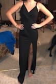 The dress is very pretty. When I received it, I realized that the lace in the back was stitched completely opposite of the other side. - Alyssa L.